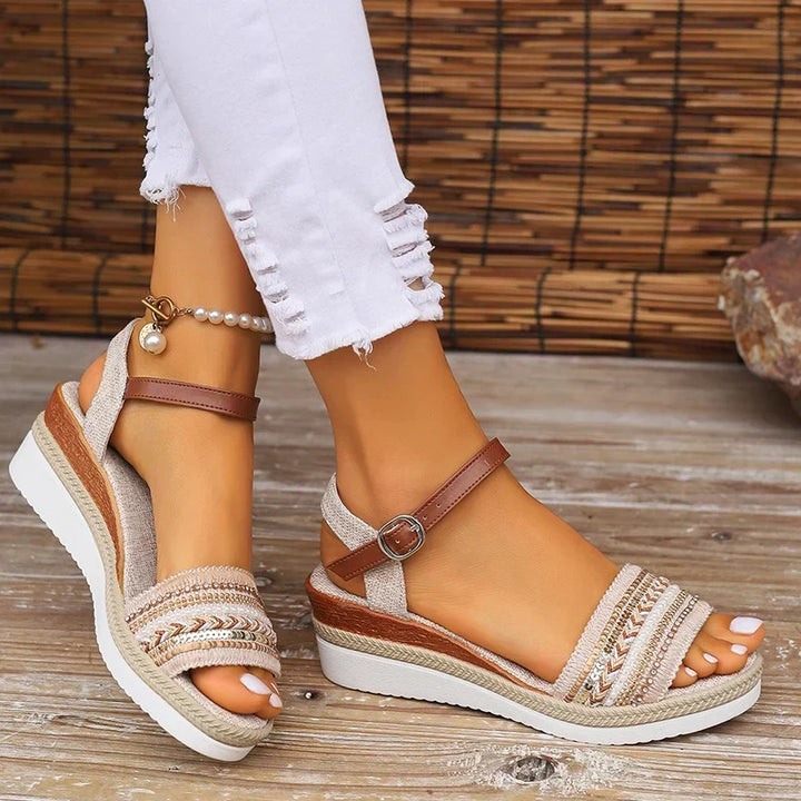 Bohemian style women's summer sandals with intricate woven details and a chic beaded design.
