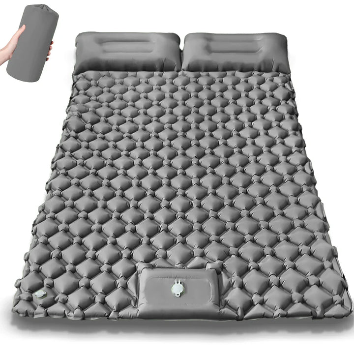 Close-up of inflation valve on Tavvitaimp18 dual air bed. Integrated pump system for quick, easy camping setup.