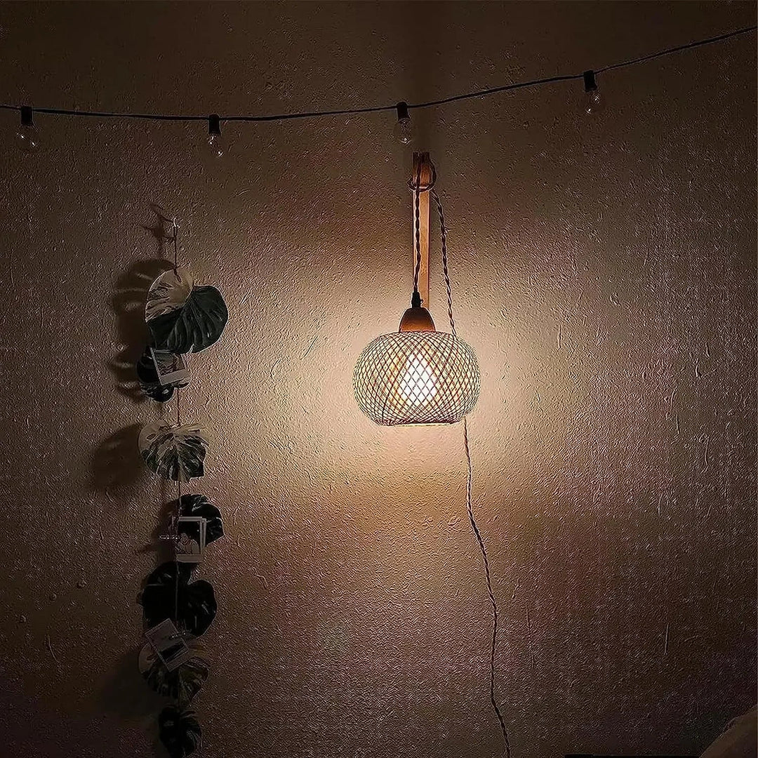 Home decor rattan wall light, handcrafted & natural, perfect for rustic or boho living spaces.