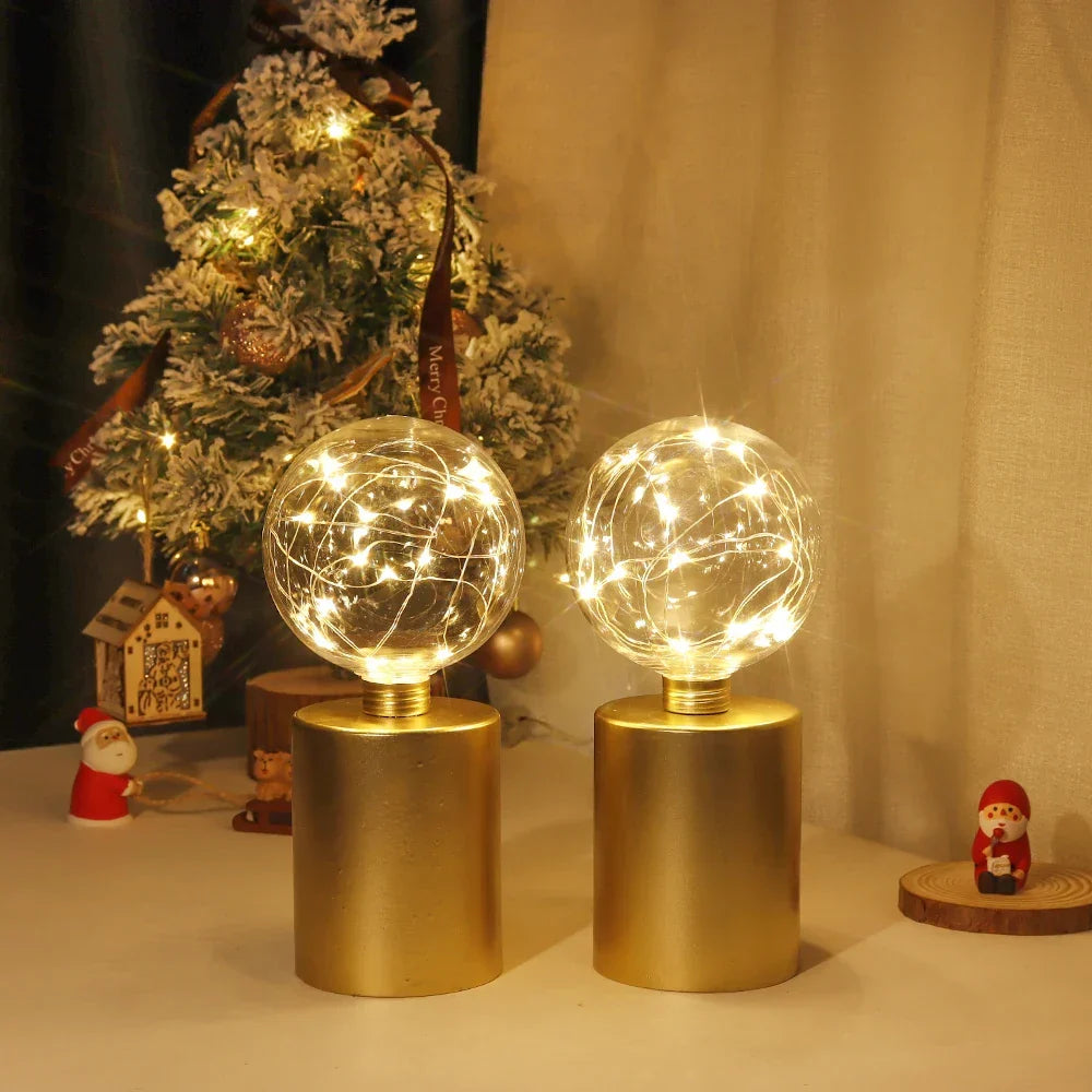 Battery powered gold LED table lamp 2-pack. Cordless design offers flexible, decorative lighting for any room.