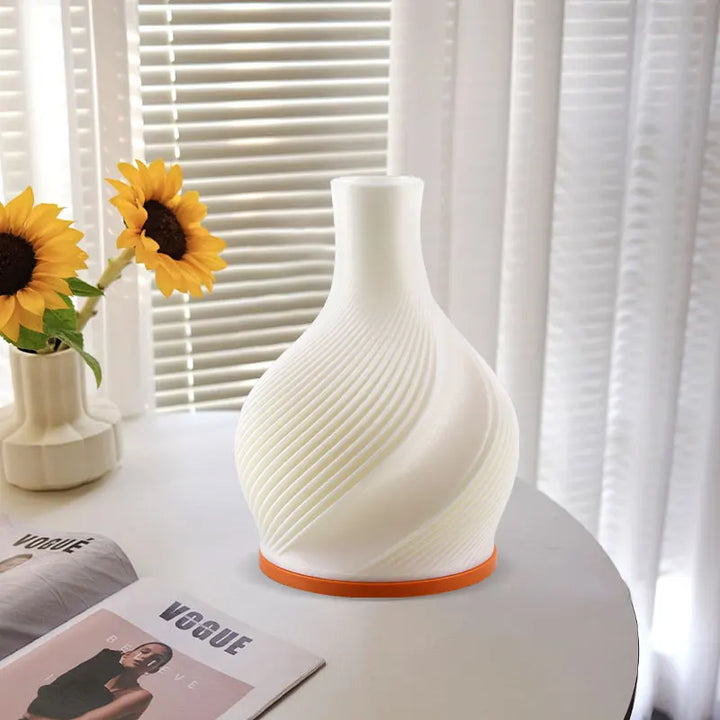 Elegant LED vase lamp for modern home decor, perfect as a table accent light.