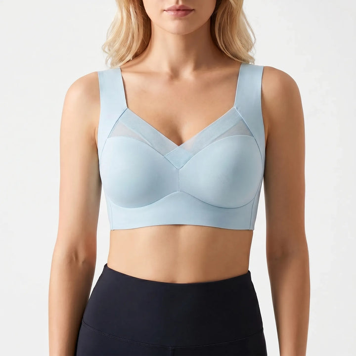 High-comfort women's seamless bra. Features soft fabric, wireless support, & stylish mesh detailing.