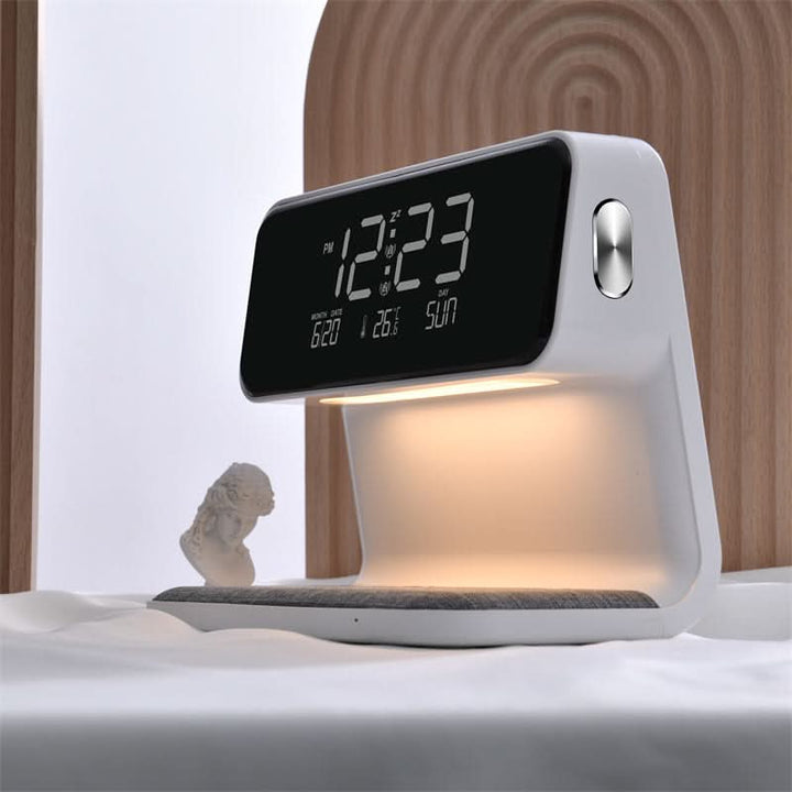 Sleek all-in-one LED lamp, wireless phone charger & alarm clock. Perfect for modern home decor & bedside.