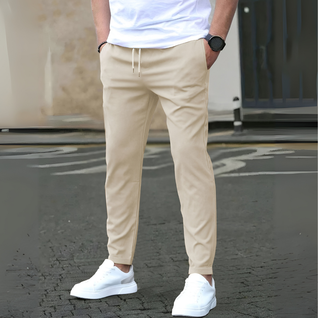 Comfortable men's slim fit drawstring pants, ideal for travel, leisure, or athletic activities.