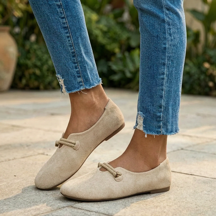 Women's supportive slip-on flats with stylish rope detail. Comfortable & easy for everyday wear.