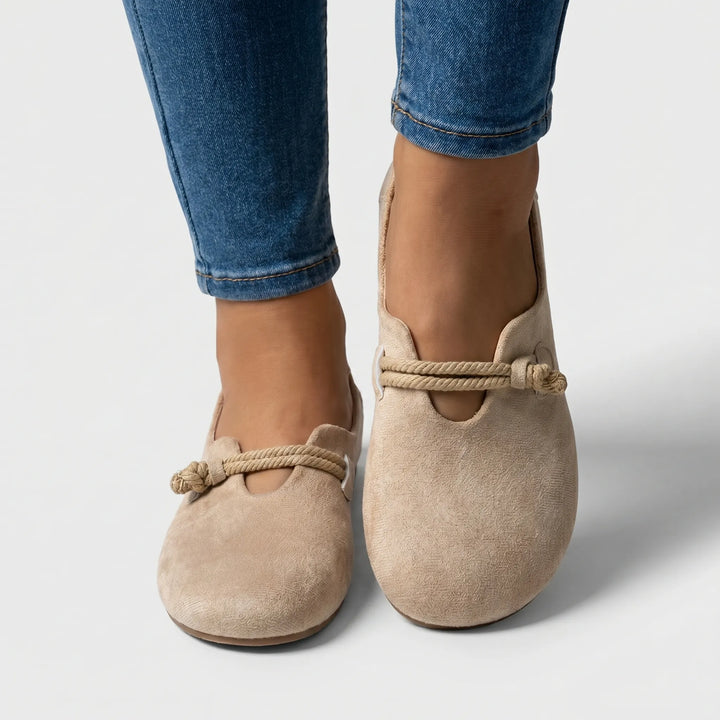 Chic women's slip-on flats. Supportive sole & trendy rope detail for comfort and casual everyday style.
