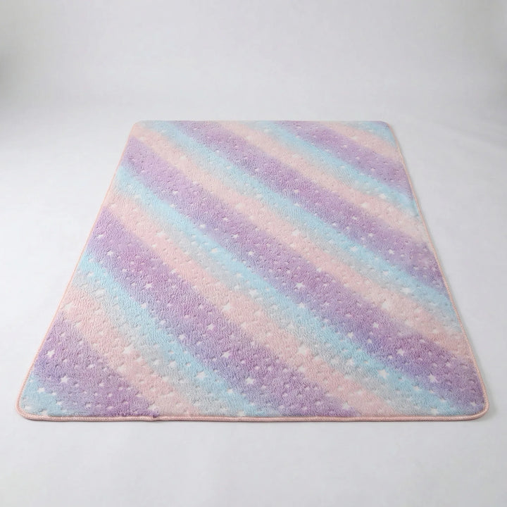 Soft & vibrant Flowique wave pattern area rug, perfect for kids' playroom or bedroom decor.