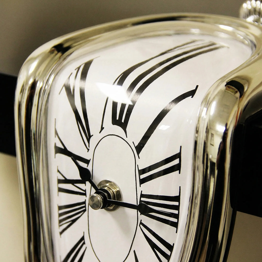 Unique surreal gold mantel clock, an artistic statement piece for contemporary homes.