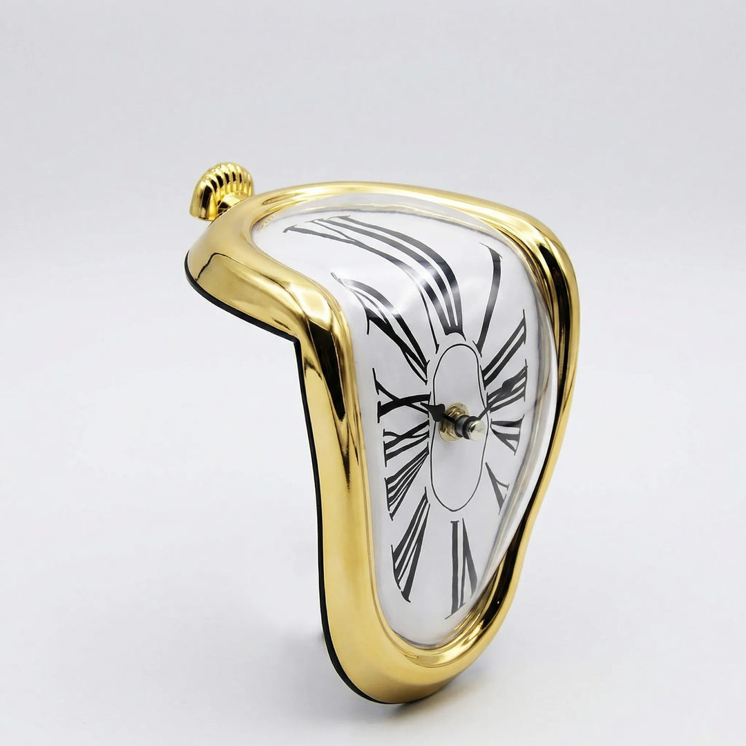 Abstract gold sculptural clock, a modern decorative accent for mantels and shelves.