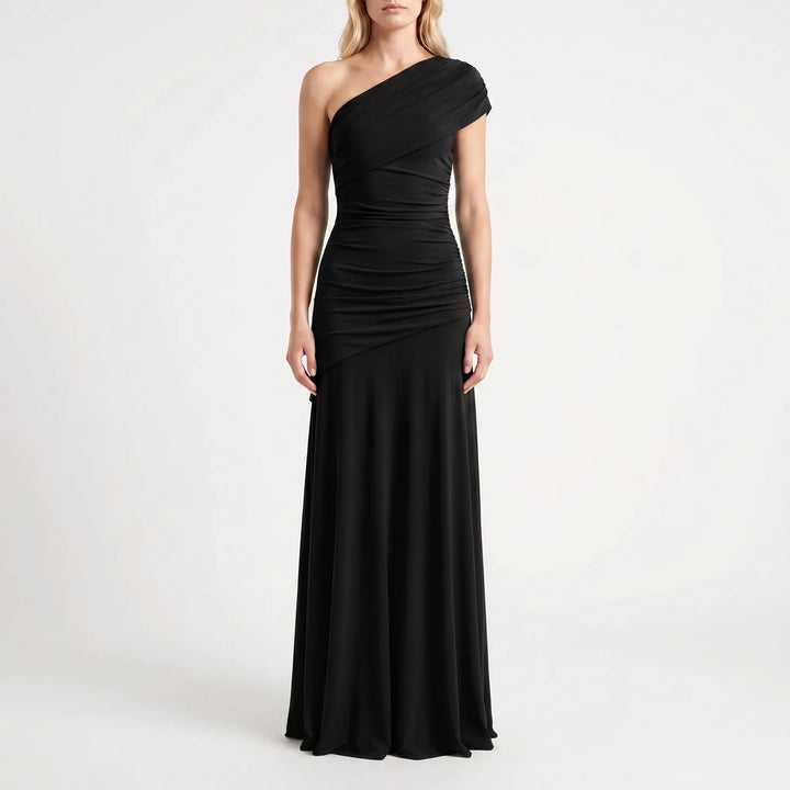 Stylish women's one-shoulder maxi dress with asymmetric design, a beautiful choice for formal events.