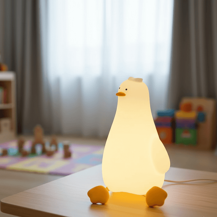 Soft silicone dimmable night light for kids, baby-safe, perfect for a cozy nursery.