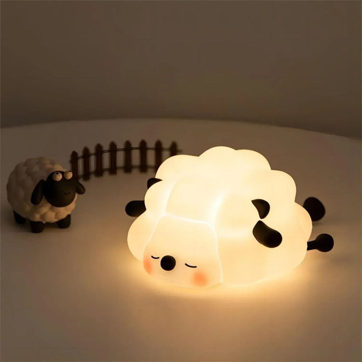 Portable dimmable silicone night light for kids, providing a soft glow for cozy sleep.