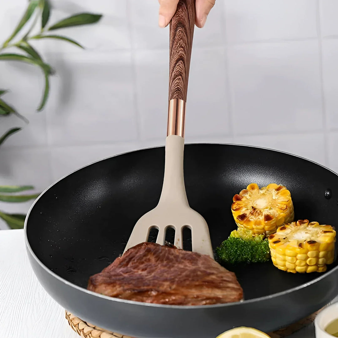 Nonstick safe silicone cooking utensils set, 10 pieces, featuring elegant wooden handles and copper accents.