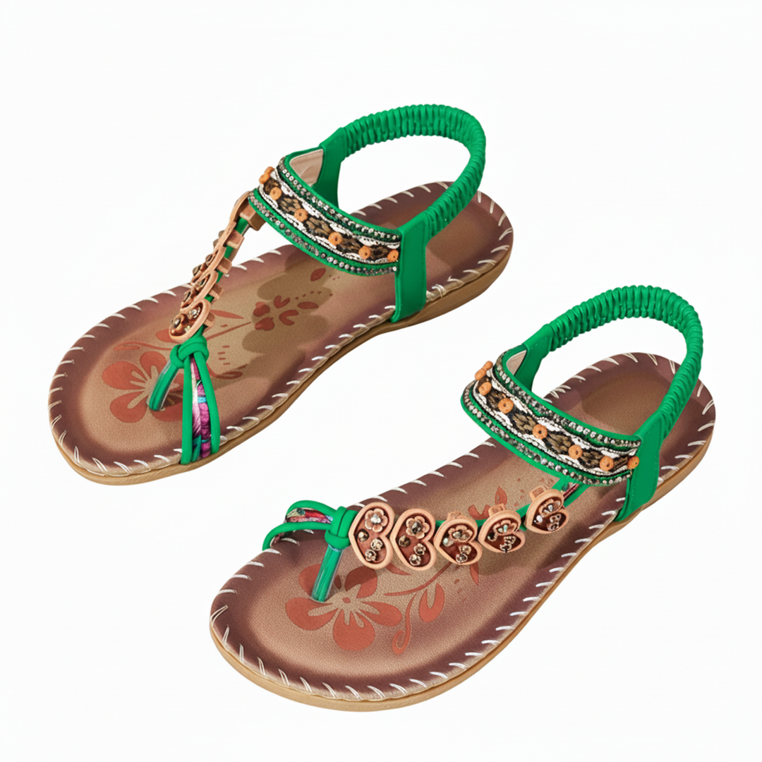 Woman walking in comfortable women's bohemian thong sandals with ankle strap. Stylish flat summer casual shoes.