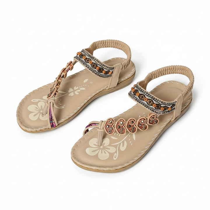Back view of women's bohemian thong sandals, highlighting the secure & stylish ankle strap. Comfortable flat design.