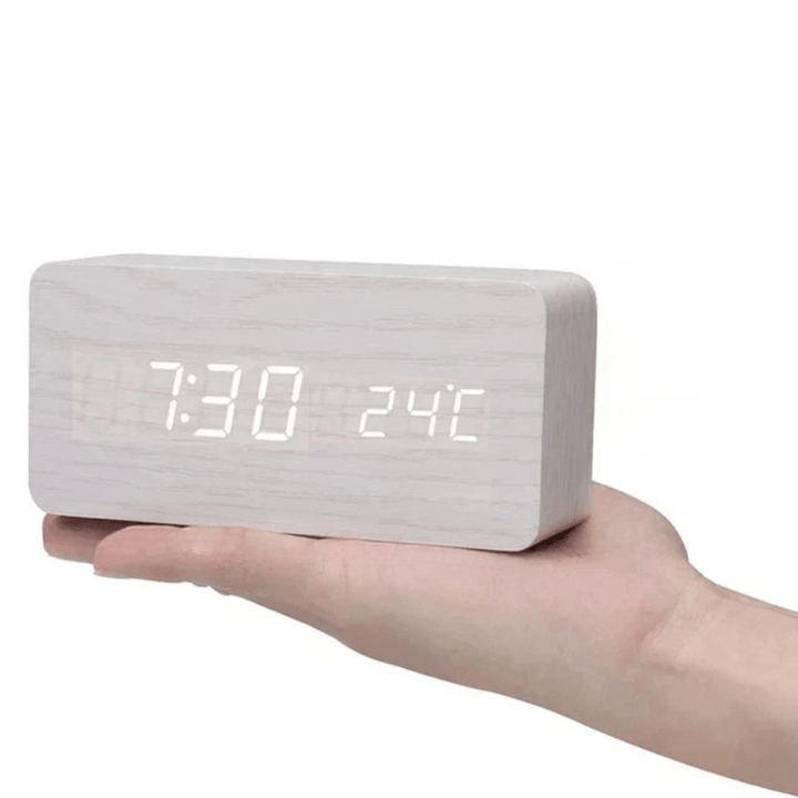 Elegant wooden LED bedside clock with voice control & alarm, a natural addition to any room.