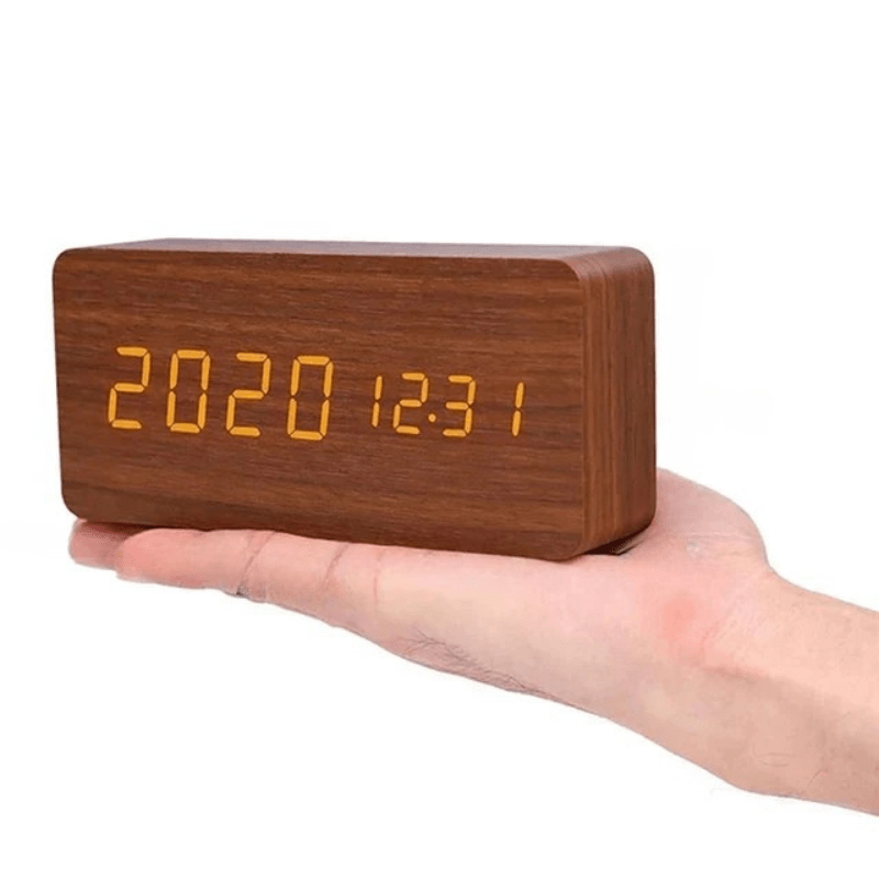 Modern wooden LED desk clock with voice command and alarm, enhancing office aesthetics.