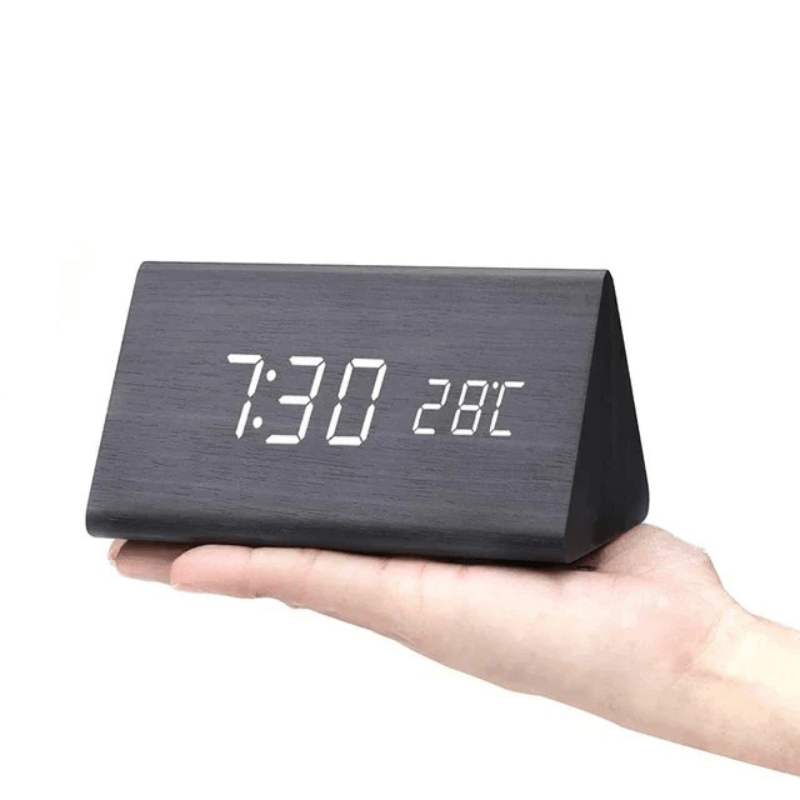 Natural wood block LED clock, smart voice-controlled alarm & digital time display.