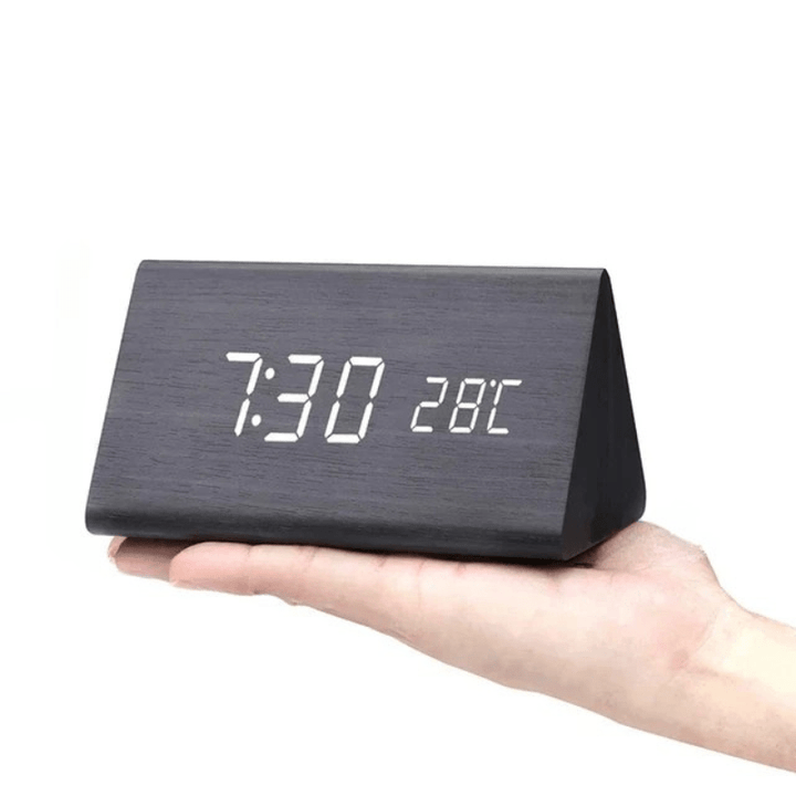 Natural wood block LED clock, smart voice-controlled alarm & digital time display.