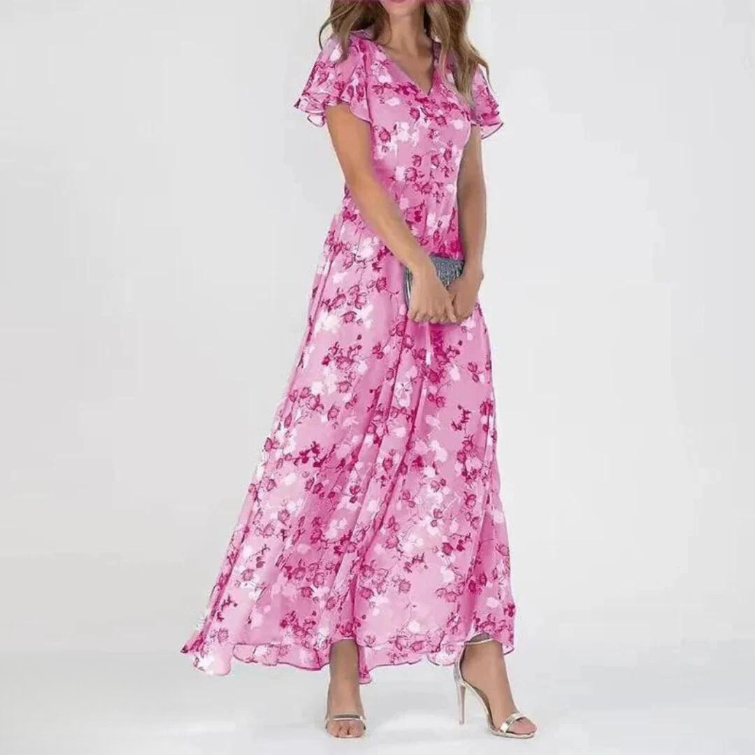 Romantic V-neck floral maxi dress for women, featuring flowy fabric and delicate flutter sleeves.
