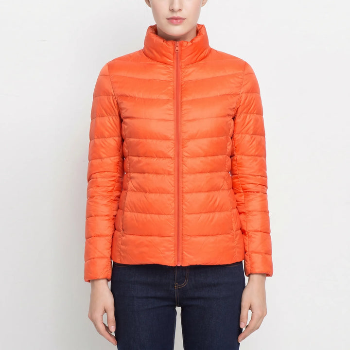 Casual women's quilted puffer jacket. Lightweight layering piece for autumn & everyday warmth.