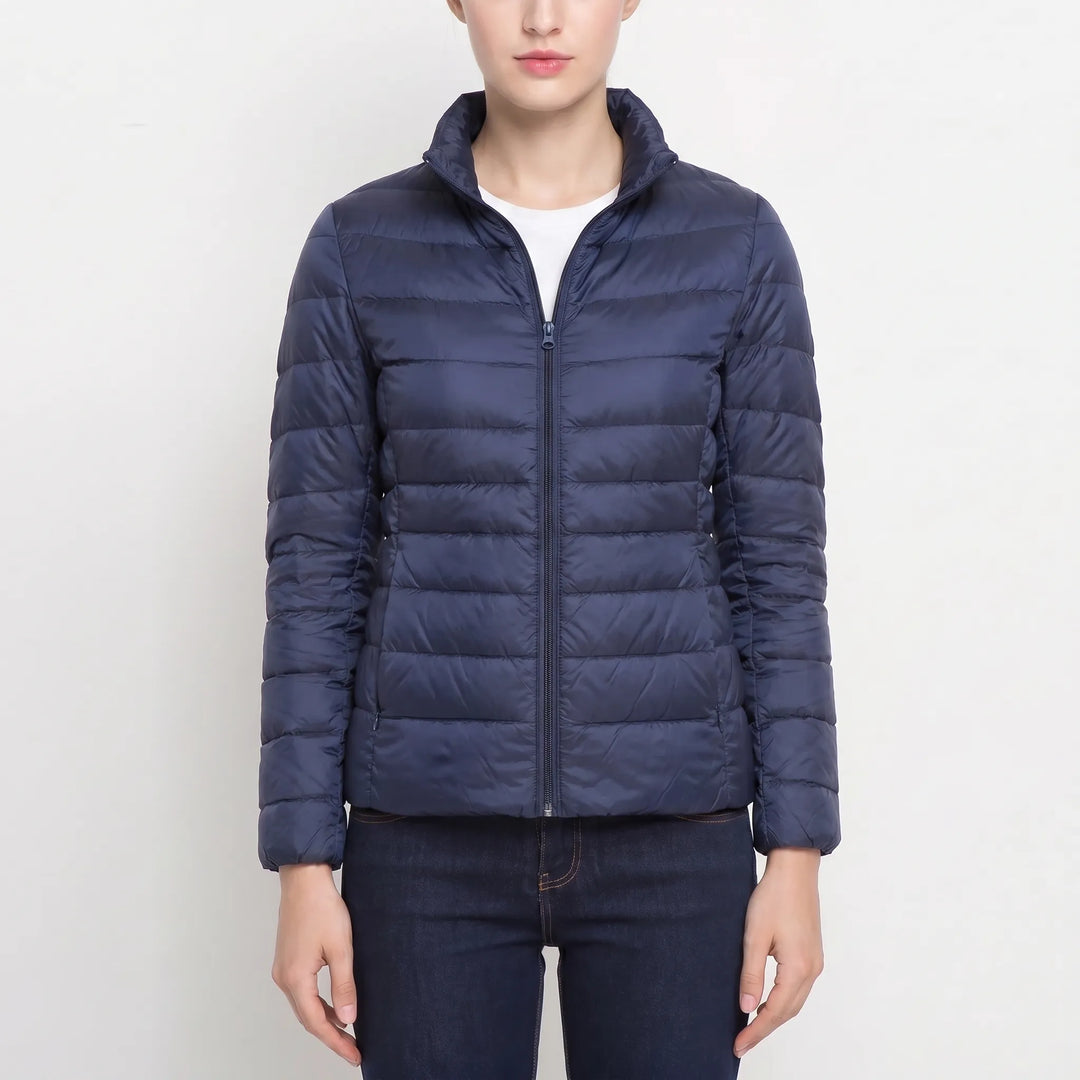 Stylish women's quilted puffer jacket. Slim fit, offers cozy warmth for autumn & winter.