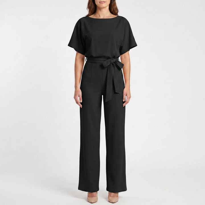 Chic belted wide-leg jumpsuit for women with comfortable batwing short sleeves. Ideal for evening or casual wear.