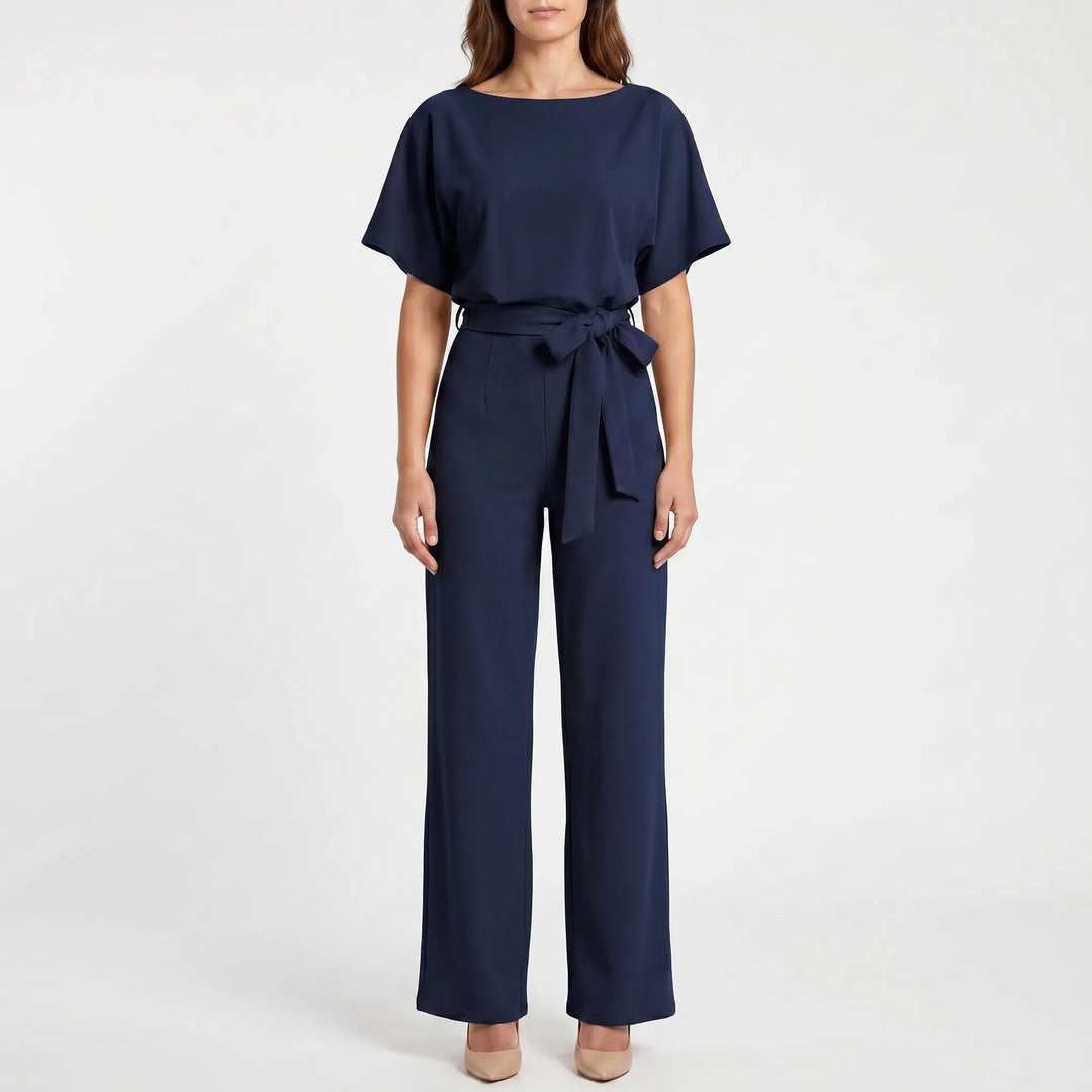 Versatile women's wide-leg jumpsuit with batwing sleeves & belted waist. Effortless for casual chic or evening wear.