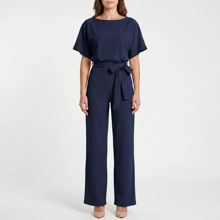 Versatile women's wide-leg jumpsuit with batwing sleeves & belted waist. Effortless for casual chic or evening wear.