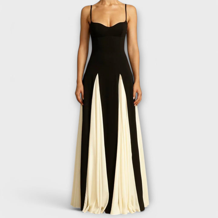 Elegant black flowy maxi sundress for women. Casual spaghetti strap summer dress, offering effortless comfort.