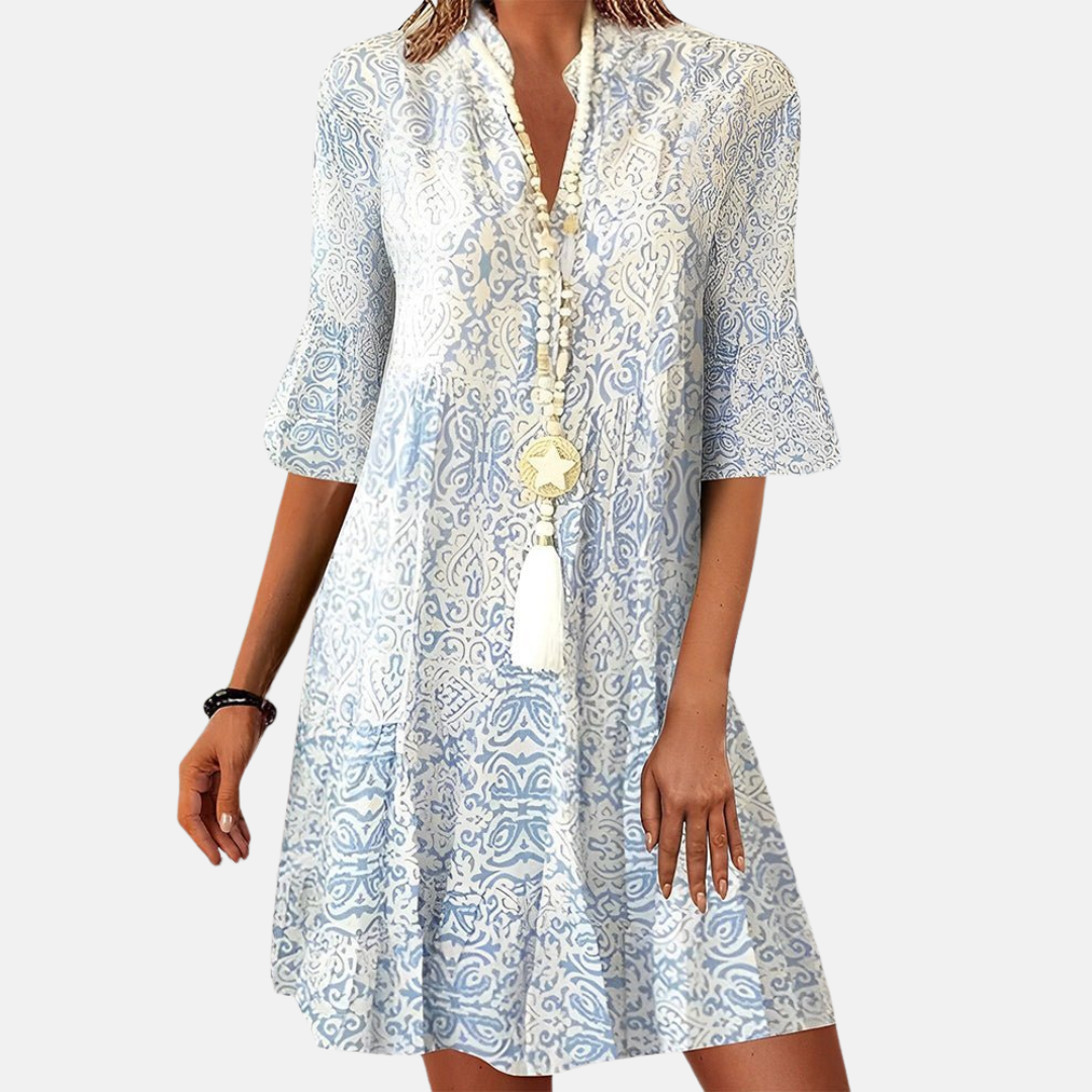 Elegant short women's dress for special occasions. Figure-flattering, chic cocktail or party dress with sleeves.