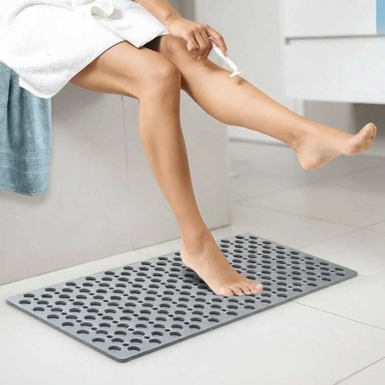 Premium anti-slip shower mat for hygienic safety. Soft, durable, and features strong suction cups for floor grip.