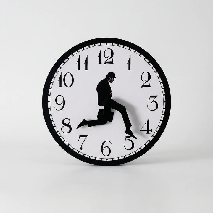 Unique whimsical wall clock for modern decor. Easy-read numbers, battery operated, a playful home or office accent.