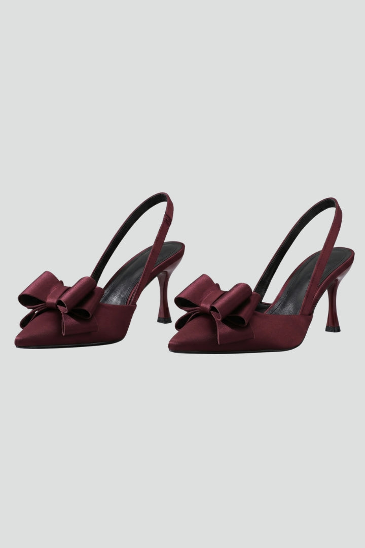 Elegant women's pointed toe high heels with chic bow detail, perfect for formal events & parties.