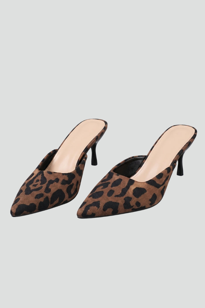 Women's elegant black pointed toe stiletto mule heels, perfect chic evening & party shoes.