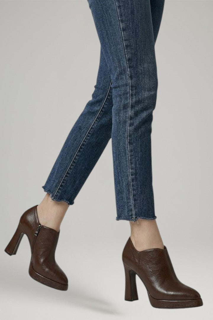 Chic women's platform pumps, elevated style. Features a convenient side zipper and comfortable block heel.