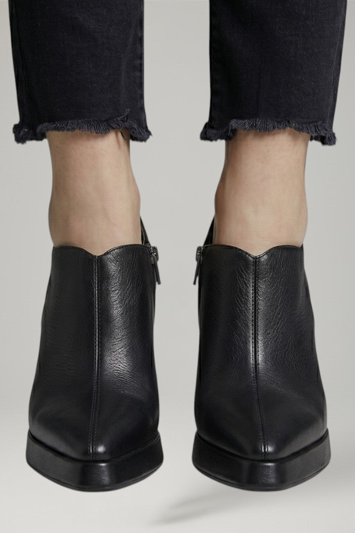 Fashionable women's platform pumps. Modern design with side zipper & elevated block heel for a chic look.