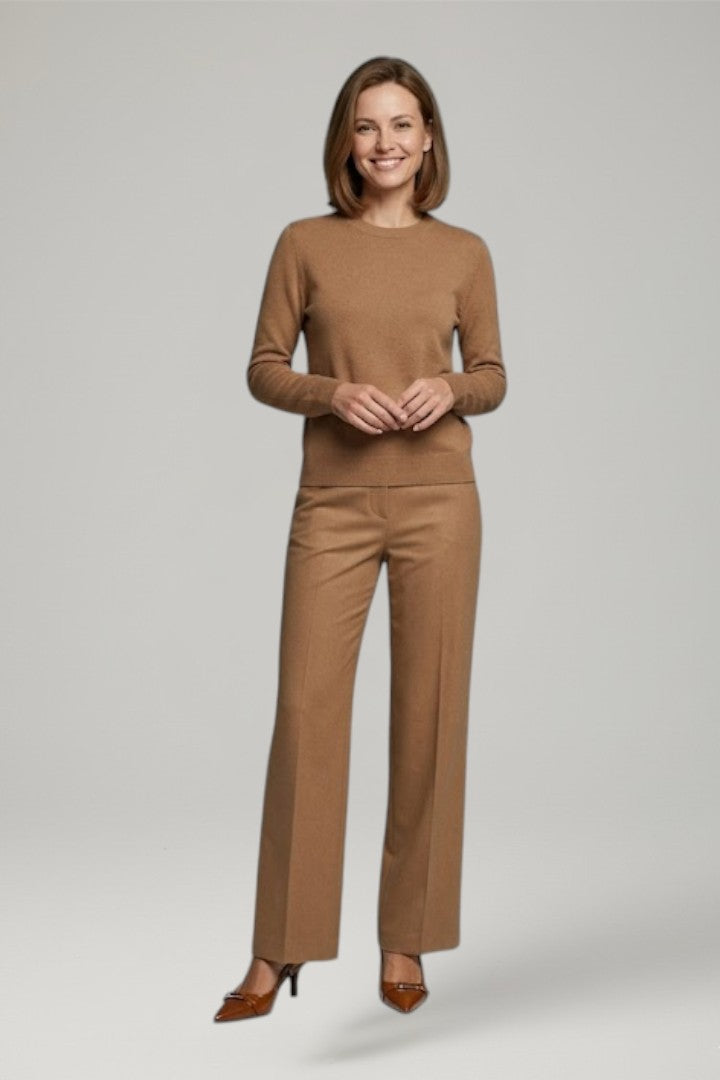 Fashionable light brown pointed toe pumps for women, featuring a sleek open back and slender stiletto heel.