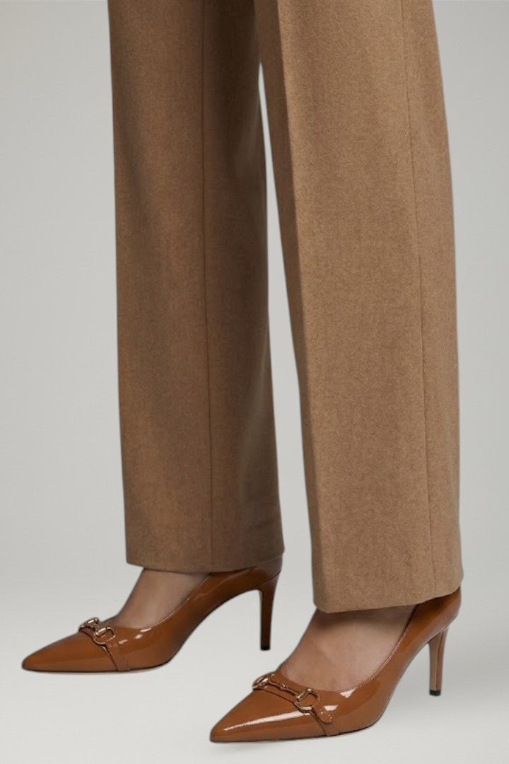 Women's light brown pointed toe open back stiletto pumps. Comfortable and stylish for dress or party wear.