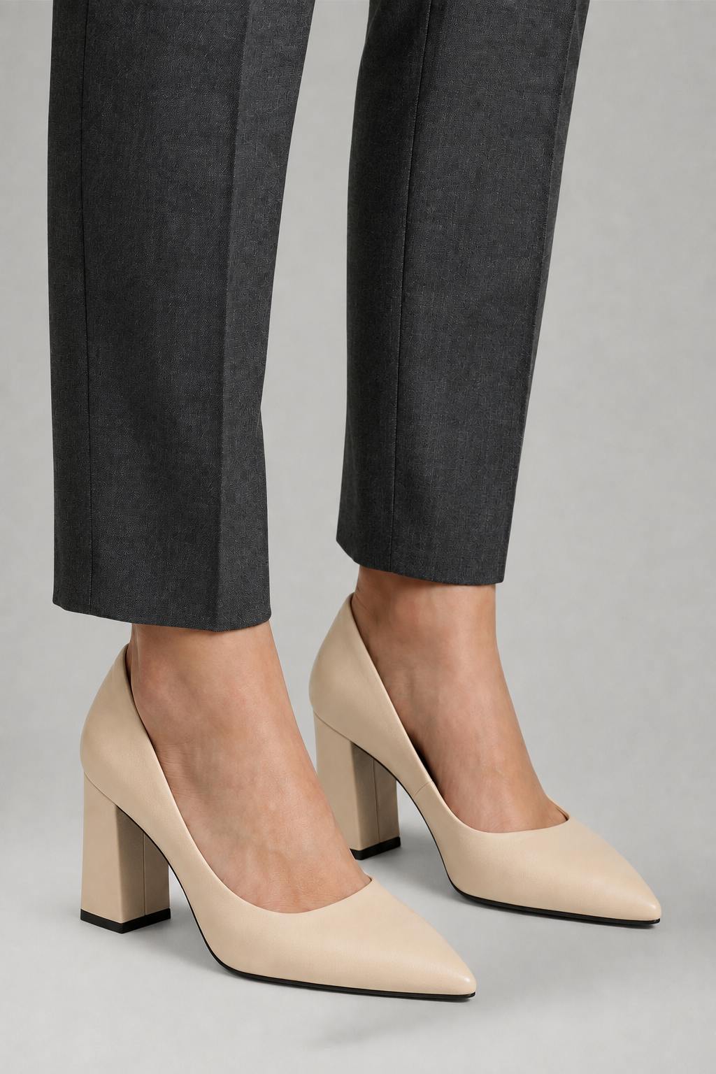 Classic women's slip-on pumps with a chic pointed toe and stable block heel, great for fashion footwear.