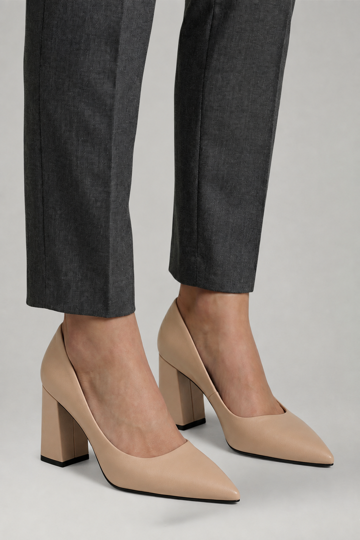 Fashionable women's pointed toe block heel pumps, elegant slip-on dress shoes for office or casual wear.