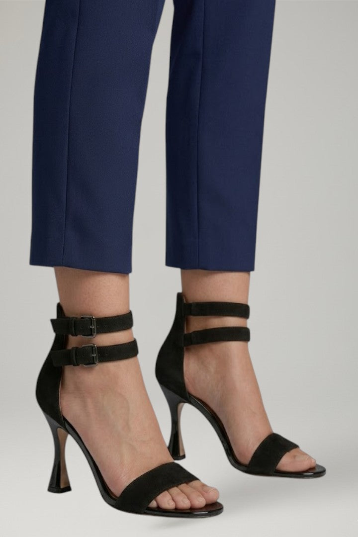 Chic women's open-toe stiletto heels with adjustable ankle strap, offering sophisticated style for any formal outfit.