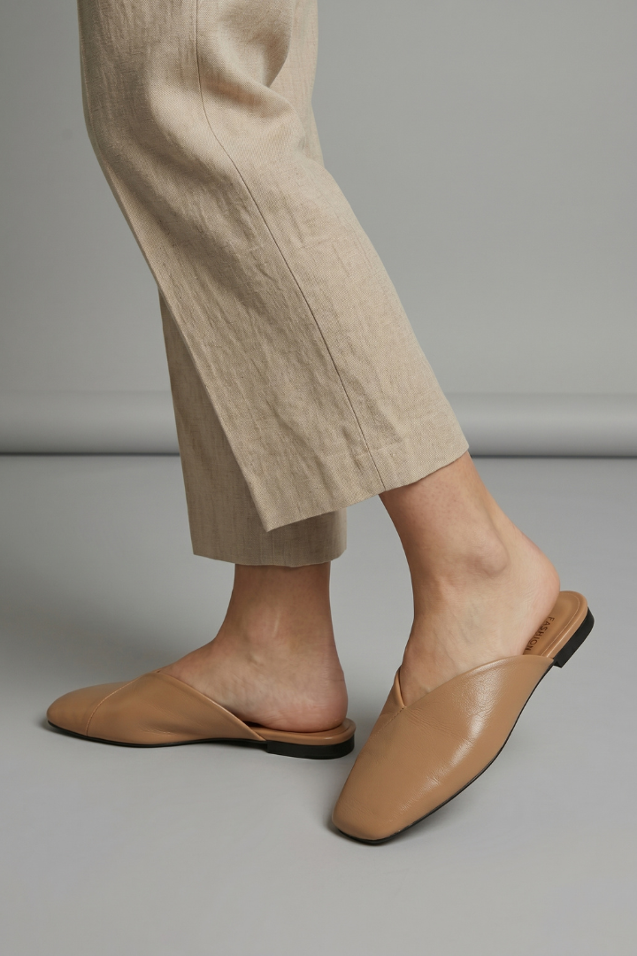 Stylish women's summer sandals featuring a contemporary square toe and convenient slip-on design.