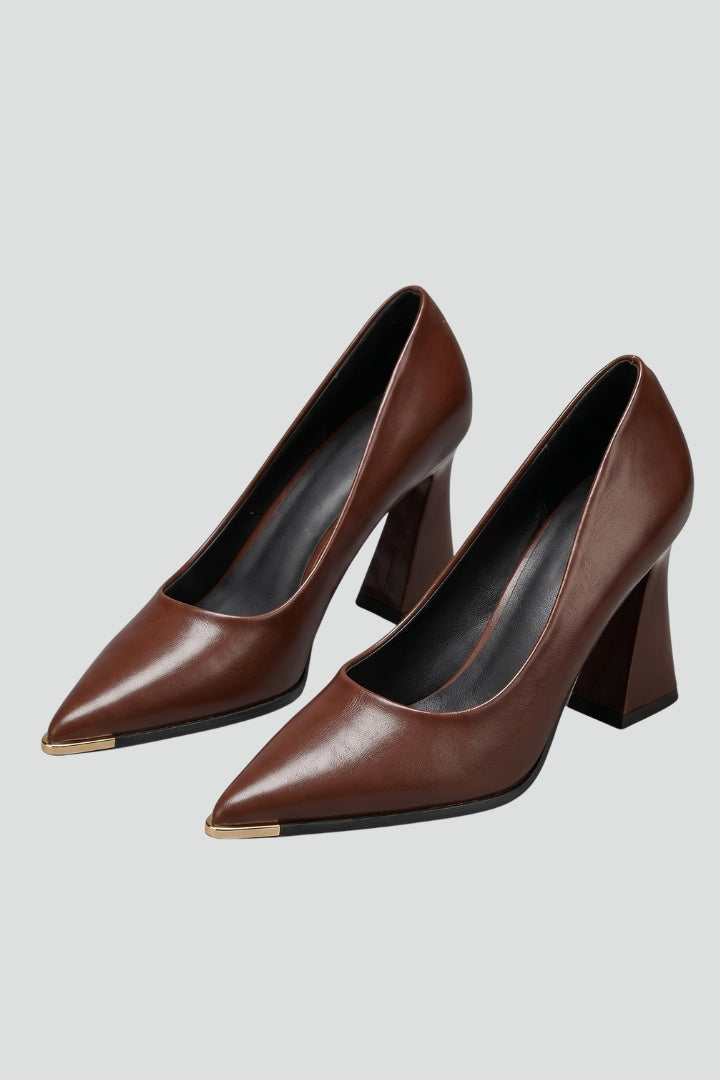 Stylish women's black slip-on pointed toe flats, perfect for comfortable everyday wear.