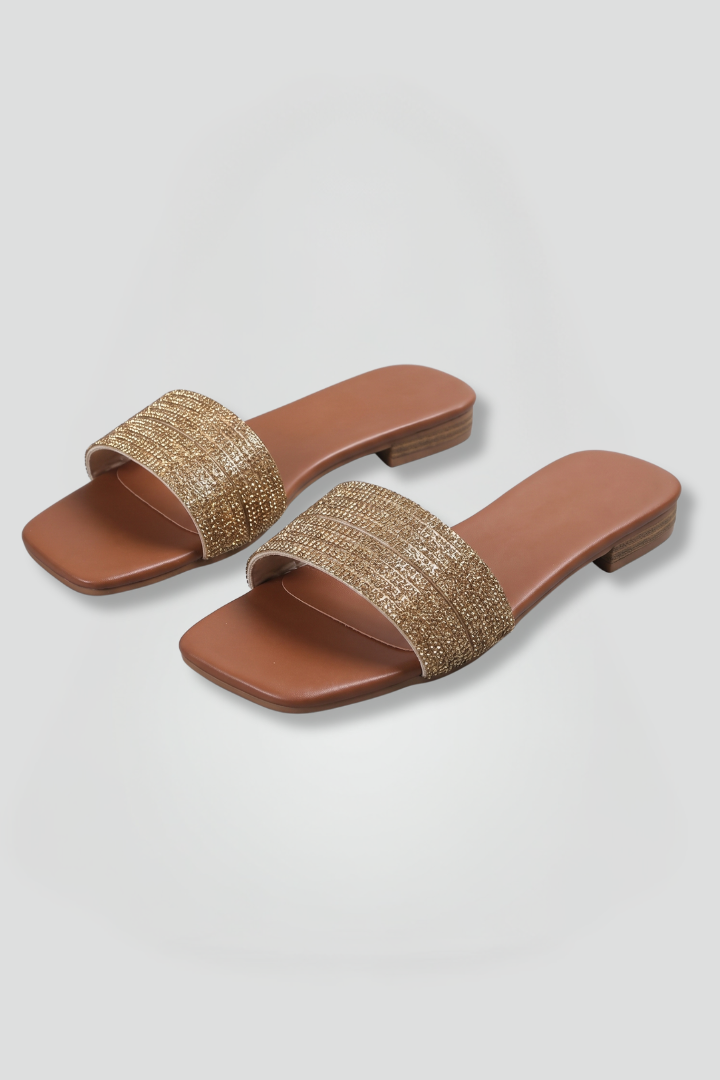 Chic women's open-toe slip-on sandals with comfortable flat sole for casual summer daily wear. Easy, relaxed style footwear.