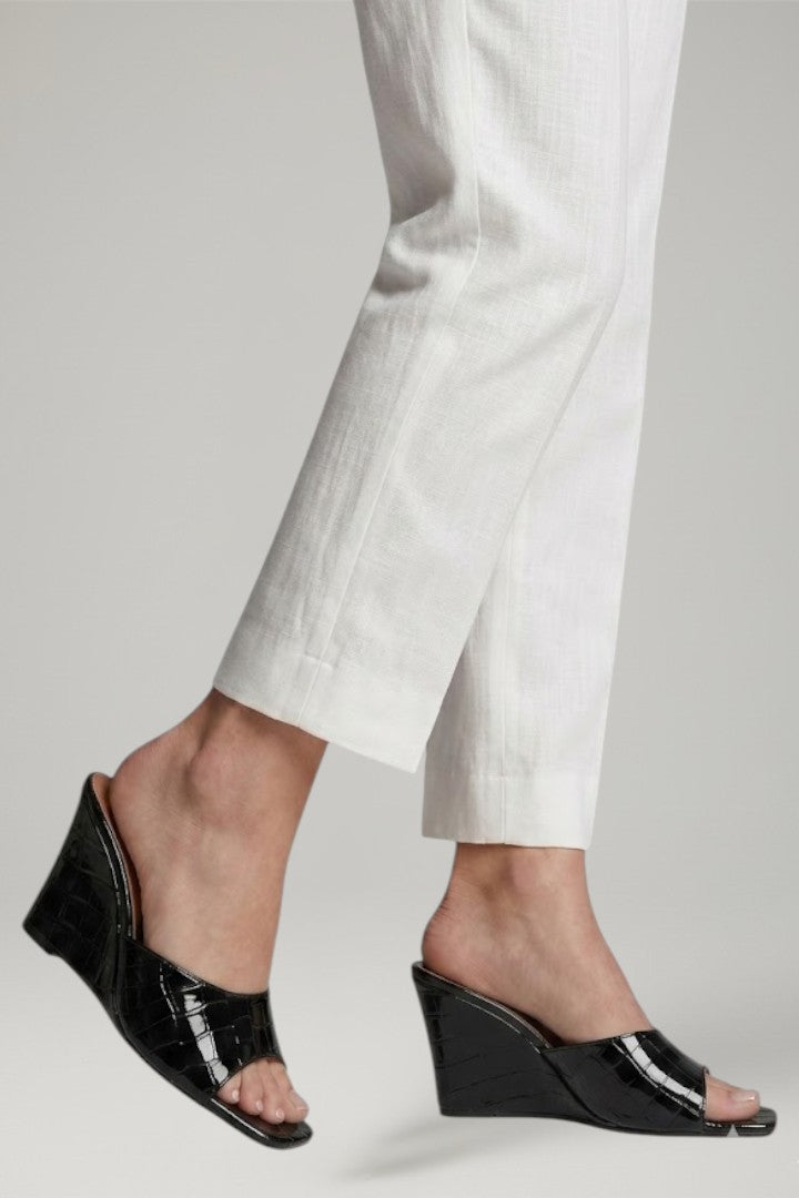 Women's elegant slip-on wedges with cushioned comfort and a stable sole, perfect for summer dress shoes.