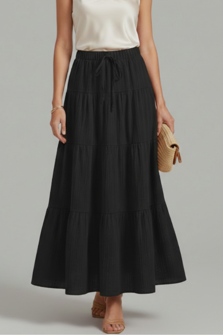Summer-ready flowy tiered maxi skirt for women, comfortable elastic waist. Casual yet elegant.