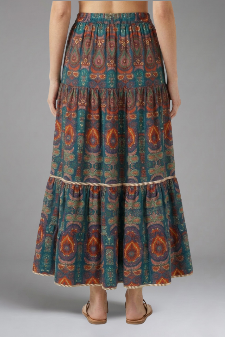 Comfortable women's long tiered maxi skirt with a flexible elastic waist for easy pull-on style.