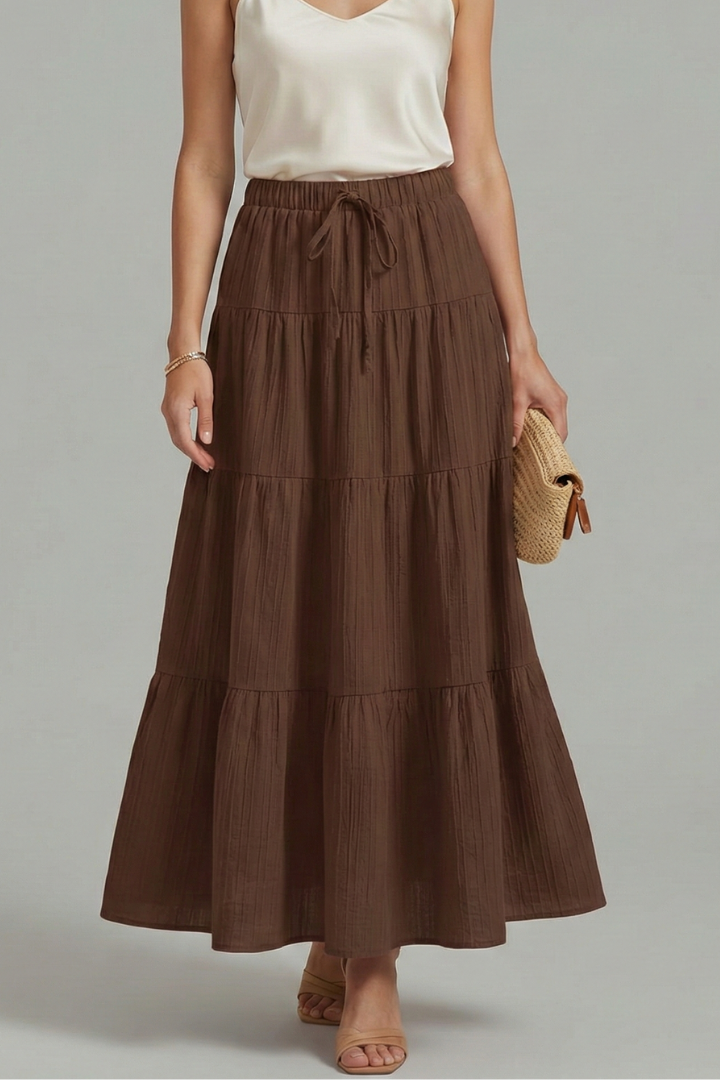 Women's versatile tiered maxi skirt. Flowy, comfortable elastic waist. Great for casual or evening wear.