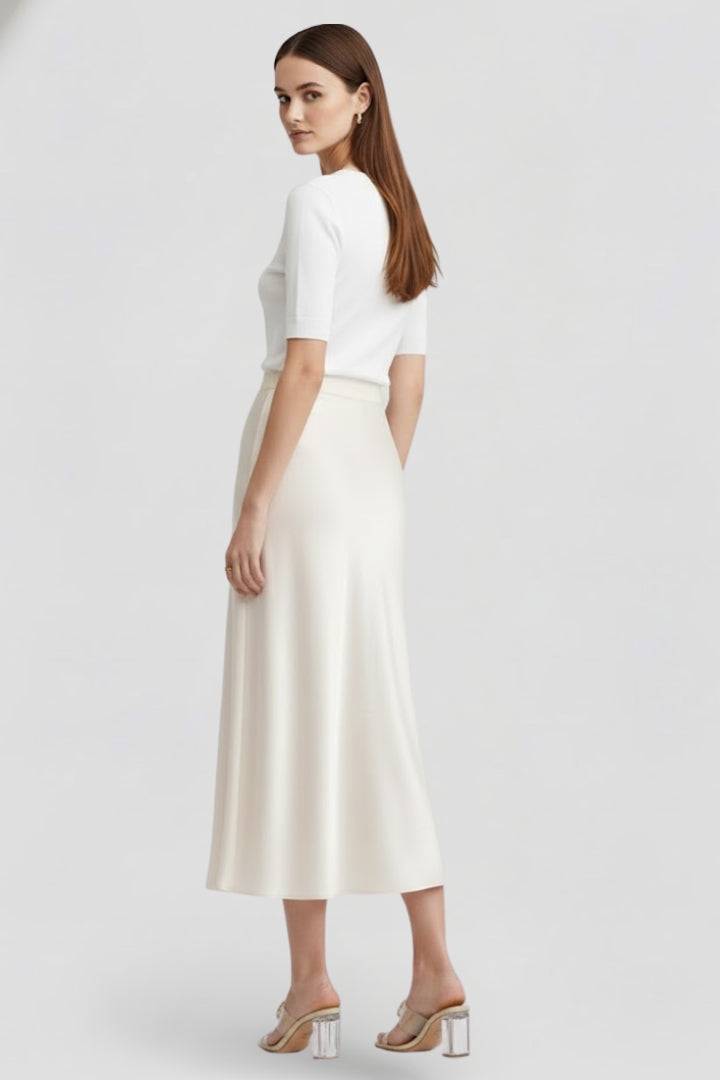 Versatile women's high waist draped white midi skirt. Elegant design transitions from day to evening effortlessly.